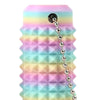 A stack of colorful, spiky fidget keychains in pastel shades of pink, blue, and green.