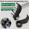 A black half shaft disassembly tool for a bull horn style control arm, shown with a close-up view.