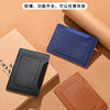 A set of three ultra-thin passport holders in black, navy blue, and brown leather or synthetic material displayed on a beige 