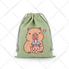 A light green drawstring storage bag featuring a cute, illustrated capybara holding a pink drink.