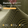 Close-up of a textured olive green velvet fabric showing elasticity and stretch