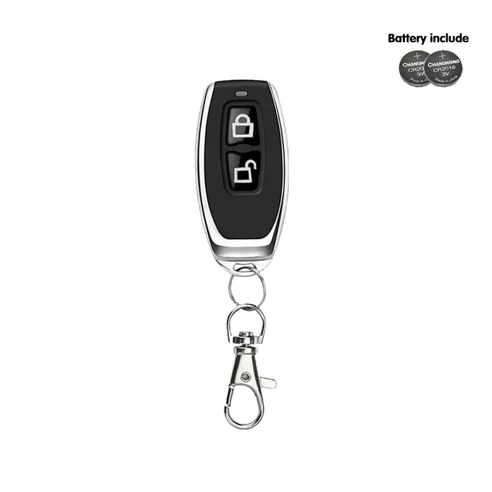 A black wireless remote control relay switch with a silver clip and battery included.