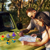 A man and a woman look at a map of rubber ducks on a green vehicle.