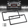 A set of two black stainless steel license plate frames for a vehicle.