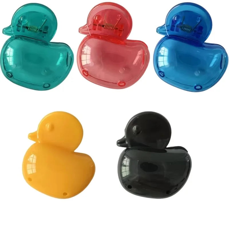 A set of four colored portable toothbrush head covers with clips in teal, pink, blue, and yellow.