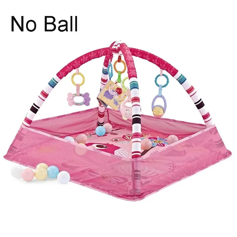 Pink baby play gym mat with hanging toys and rings for infant activity