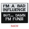 Black and white embroidered patch with text I'M A BAD INFLUENCE BUT DAMN I'M FUN!!!