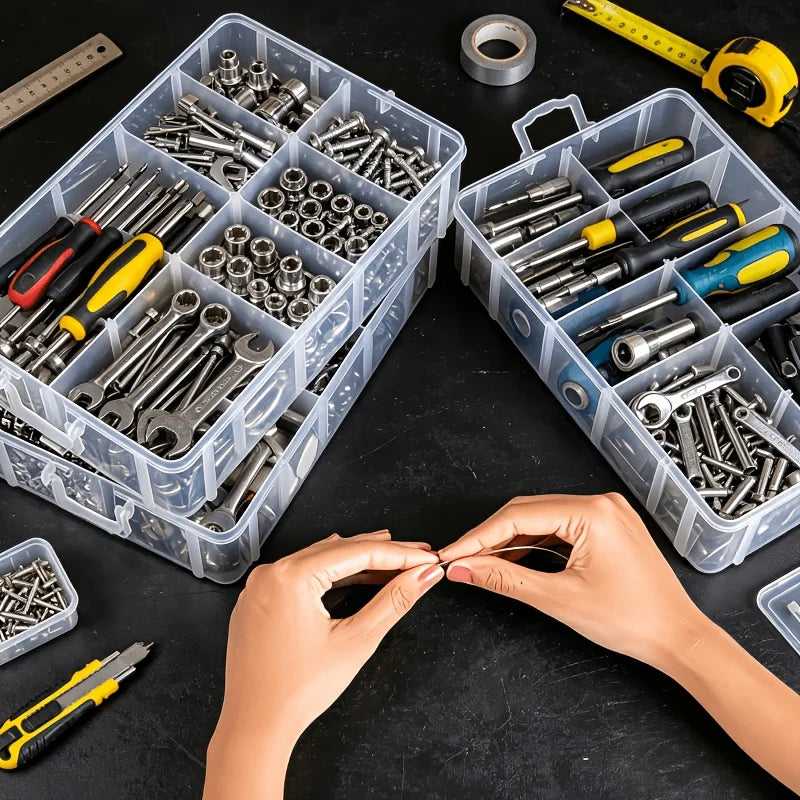 A hand is organizing small metal hardware parts inside a clear plastic storage organizer box.