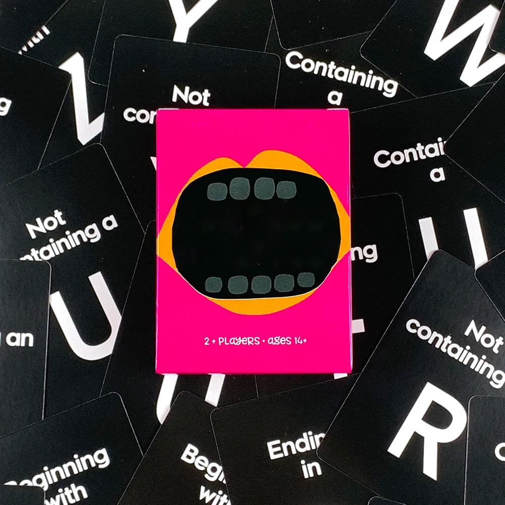 A pink card game box featuring a black silhouette of a mouth and text indicating 2+ players and ages 14+