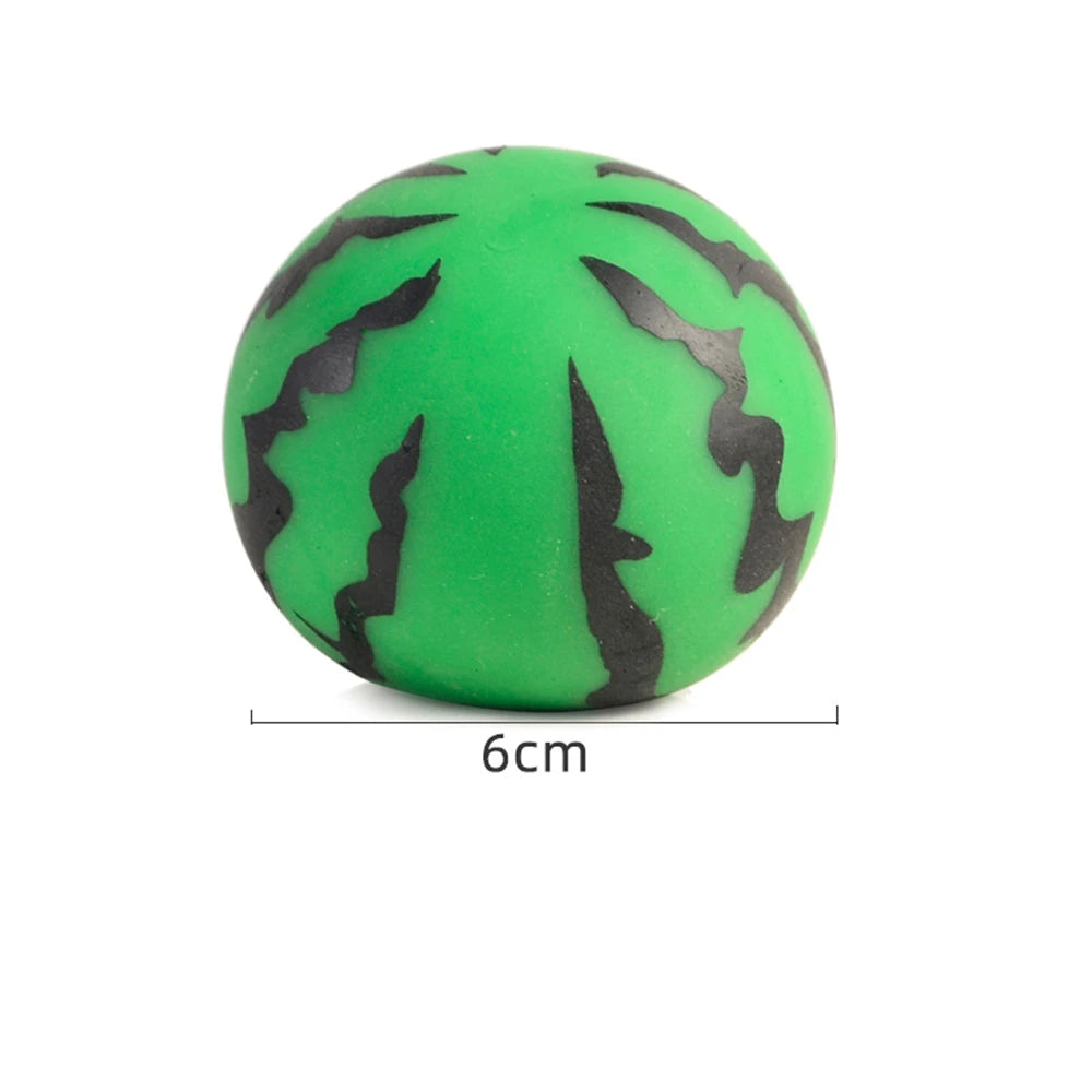 A bright green squishy toy ball with black, abstract, wavy markings.