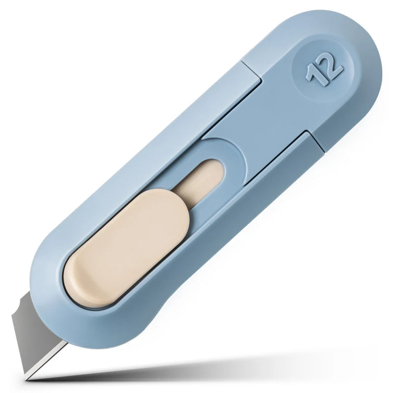 Helles blaues Präzisions-Mini-Papiercutter mit beige Klinge und 12-Markierung.