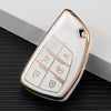 A white and rose gold TPU car key fob cover with various buttons is shown on a dark surface.