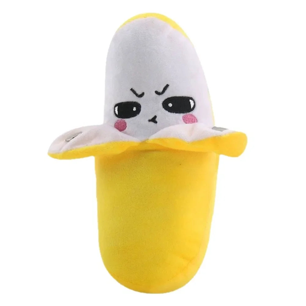 A yellow plush toy shaped like a banana with a white top and a distressed face.