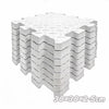 A stack of white interlocking foam play mats for babies and toddlers.