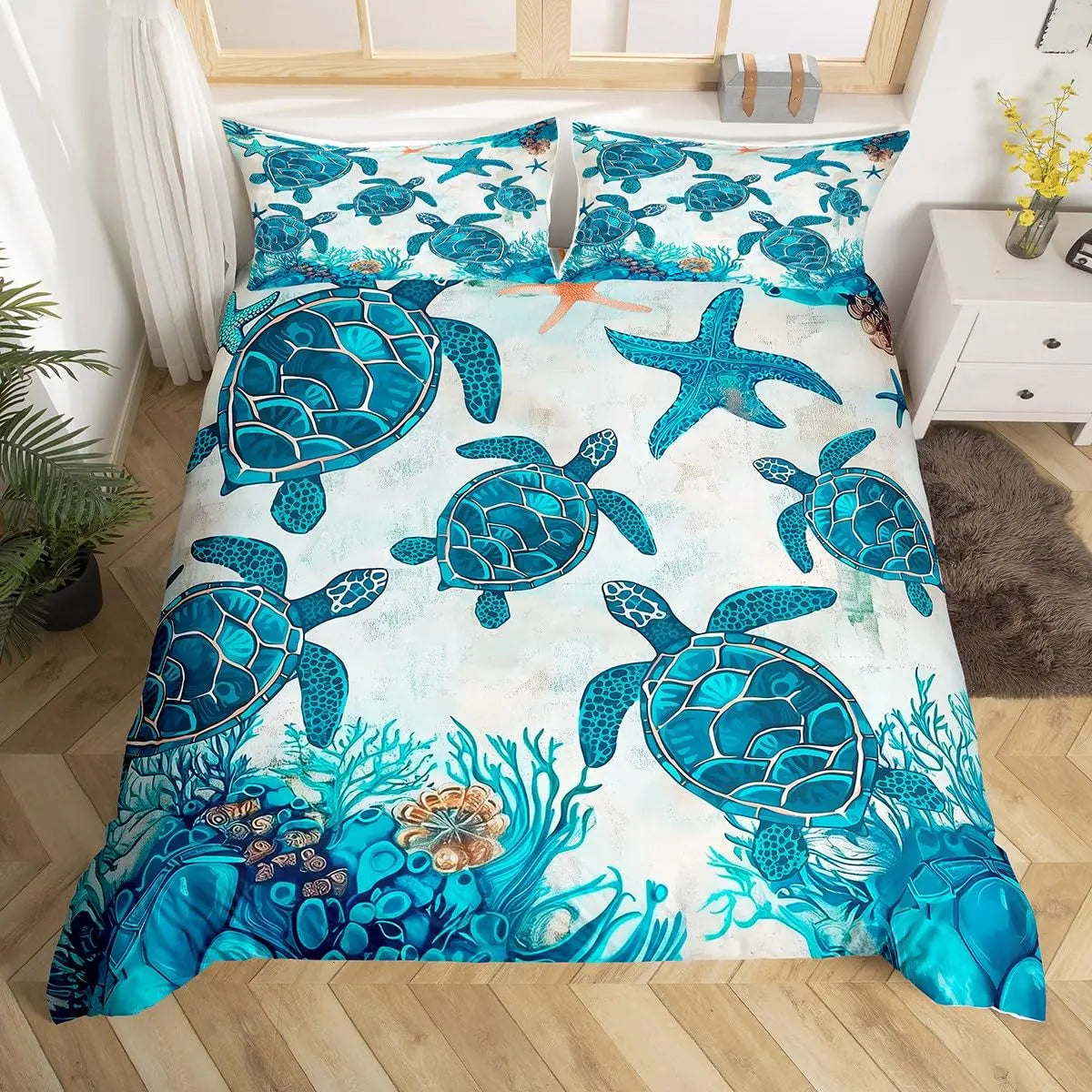 A duvet cover set featuring blue sea turtle designs on a white background.