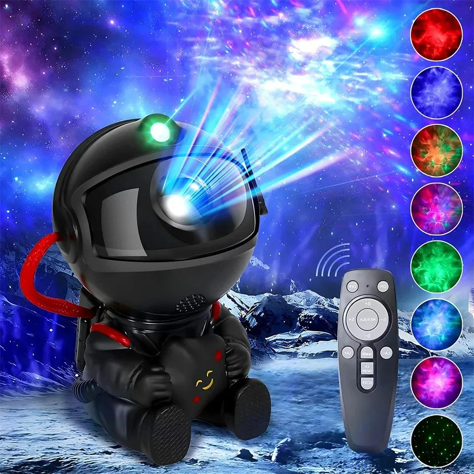 A black astronaut night light projector shining bright blue and green light against a snowy, starry background.