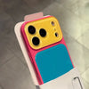 A color blocking shockproof phone case featuring a large camera window and a vibrant blue back panel.