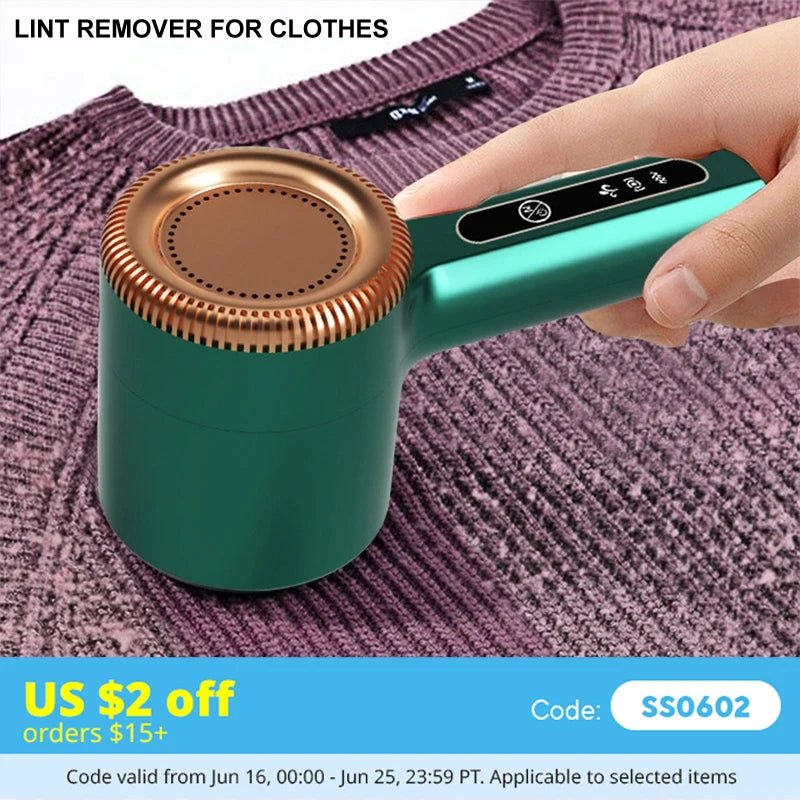 A hand holds a teal electric lint remover device against a purple knitted garment.