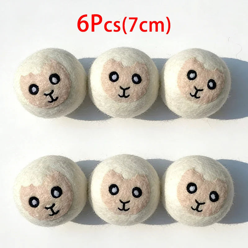 Six natural wool dryer balls with a light beige color are displayed on a white background.