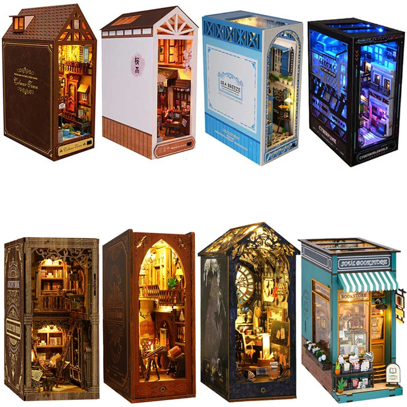 A set of four miniature DIY book nook kits depicting detailed, illuminated bookshelf room scenes.