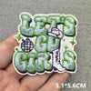 Embroidered patch featuring the text LEGS and GIRS in green and gray thread on a light background