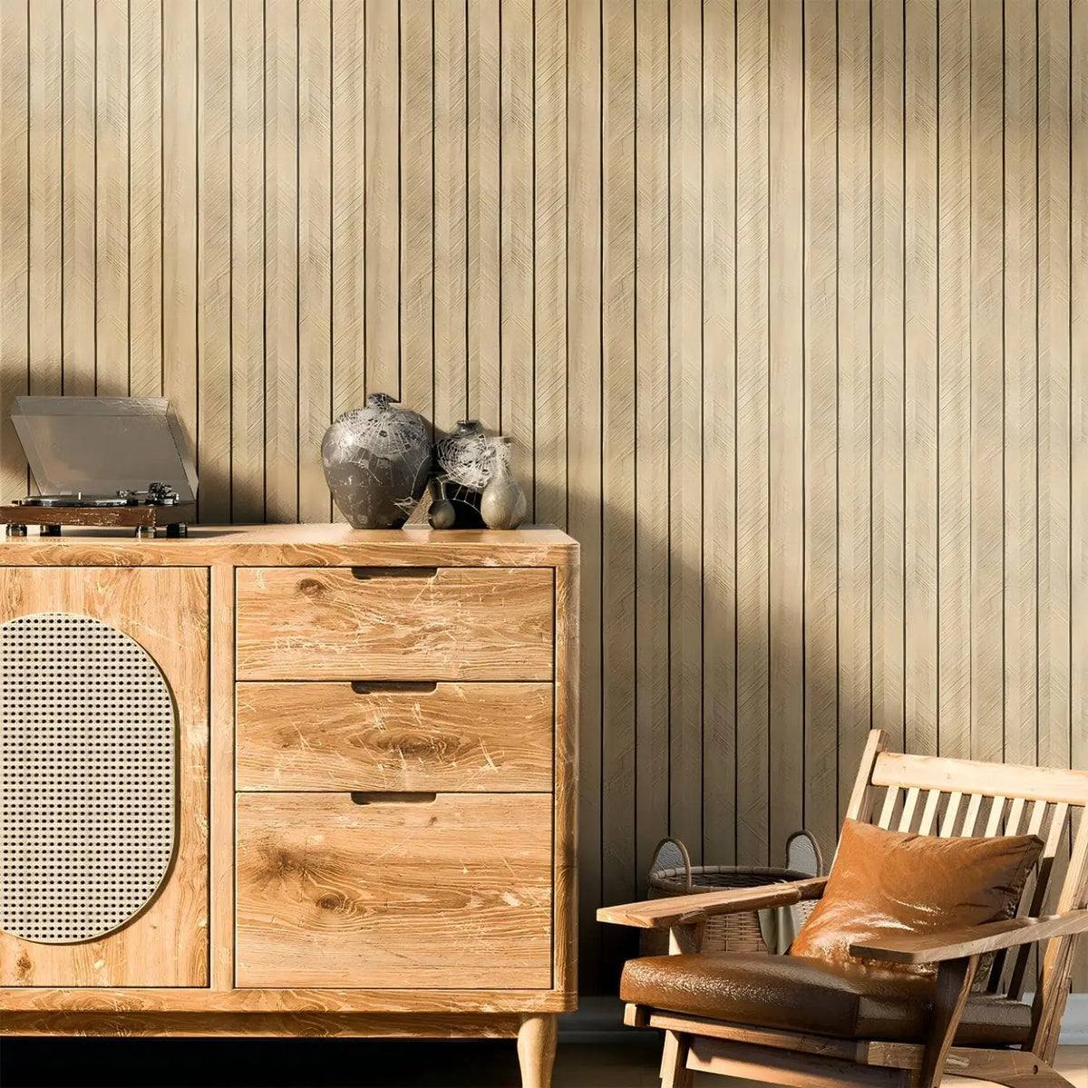 A wooden dresser with drawers and a chair sits against a vertical wood grain wall panel.