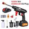 A black high pressure car wash gun with a red nozzle and various accessories including a battery and foam generator.