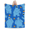 A blue plush blanket featuring characters from Sesame Street Friends
