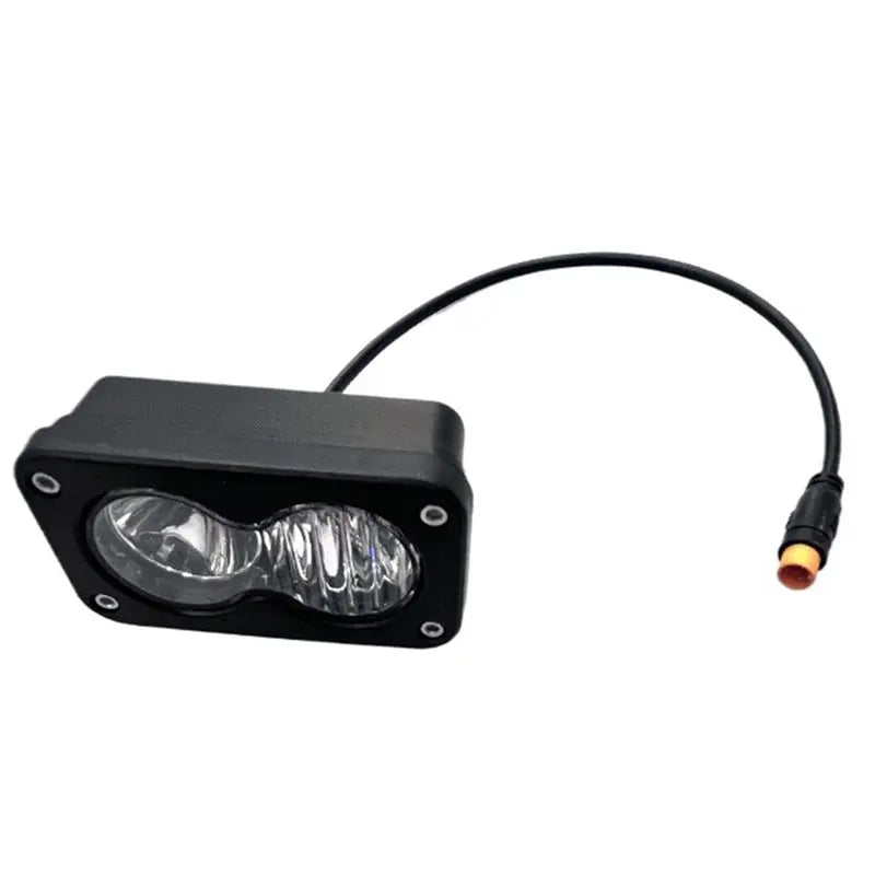 Black high-intensity waterproof LED pod spotlight headlight with a flexible wire.