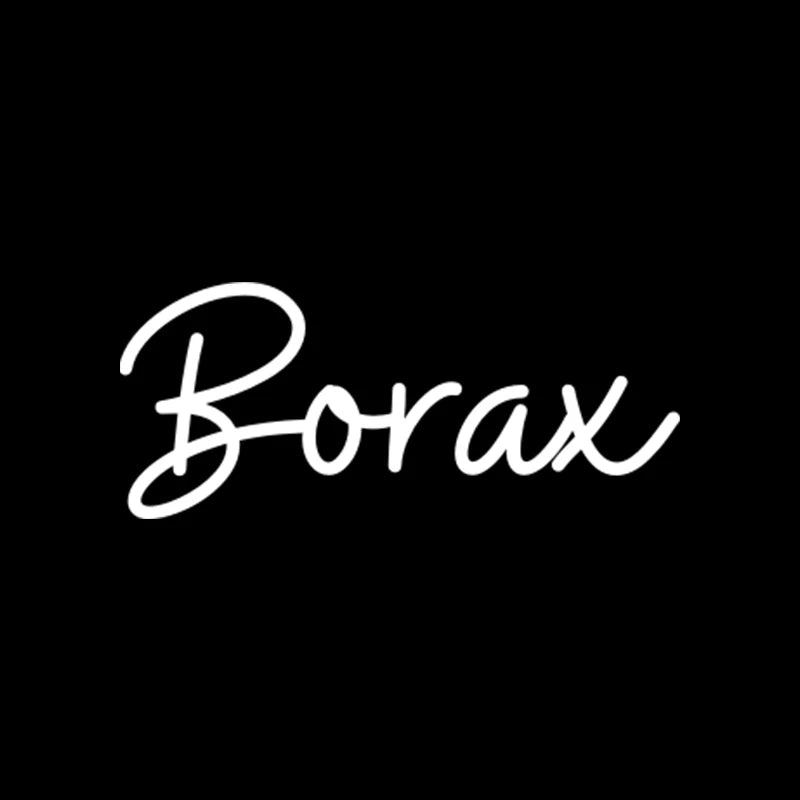 Handwritten white text spelling Borax on a black background