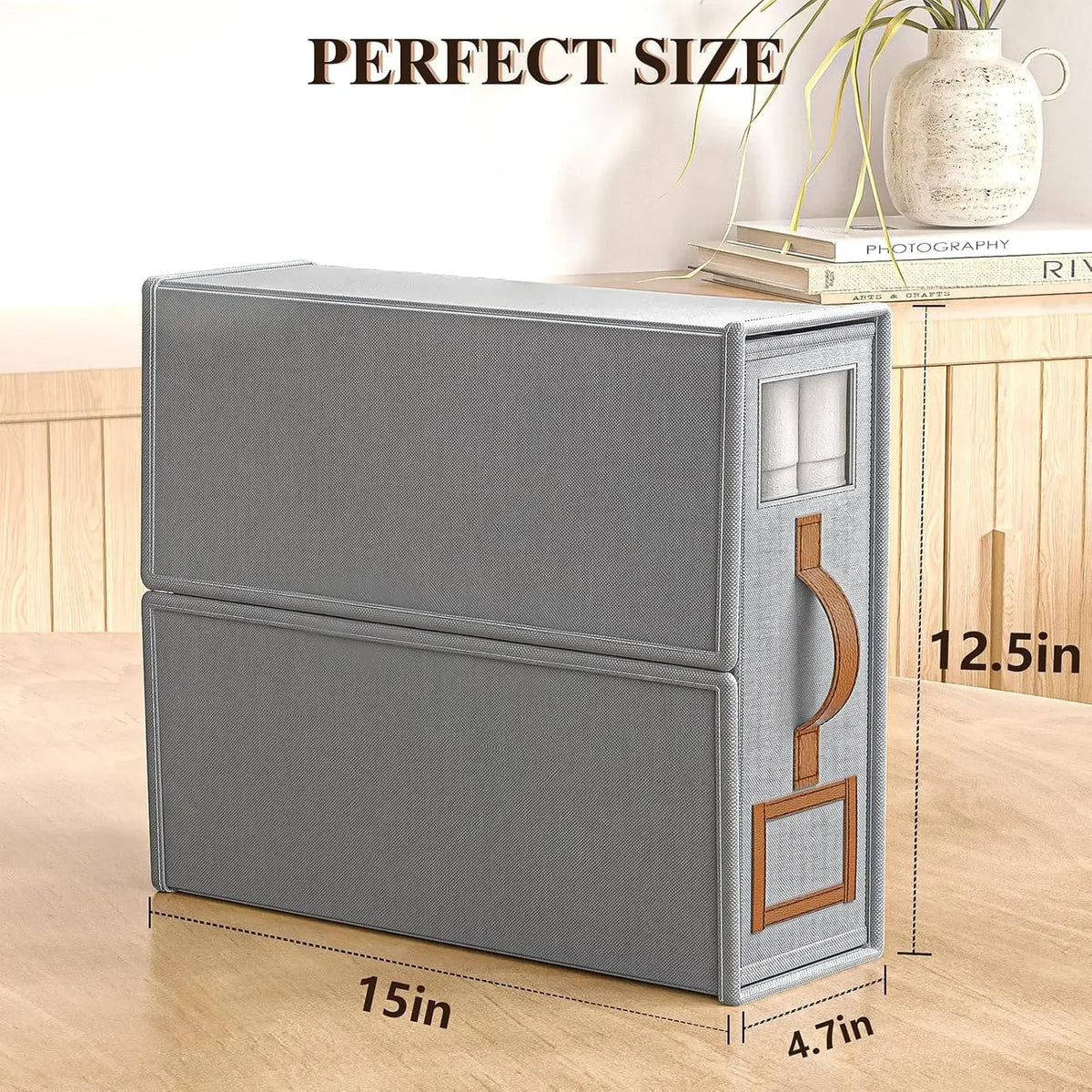 A gray foldable bedding storage box with a clear window shown on a wooden surface.