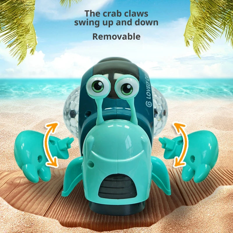 A teal crab toy is shown with removable claws on a sandy beach background.