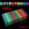 A bulk pack of 100 multicolor acrylic D6 dice in various colors and shapes arranged in a row.