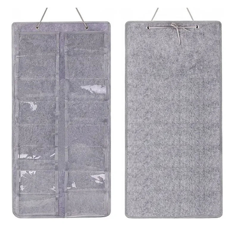 A gray felt eyewear organizer with sixteen slots, designed for hanging or wall mounting.