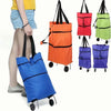A collection of colorful foldable rolling shopping bags in blue, orange, purple, and green.