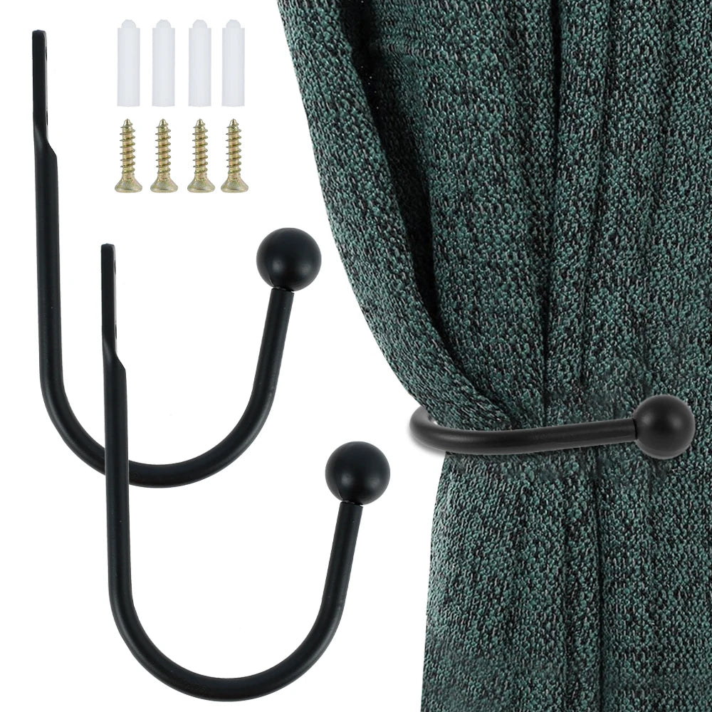 Black retro iron curtain tieback hooks with U-shaped holders and screws shown next to a teal fabric.