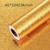 Roll of gold heat-resistant oil-proof kitchen stove backsplash sticker measuring 40x200cm per roll.