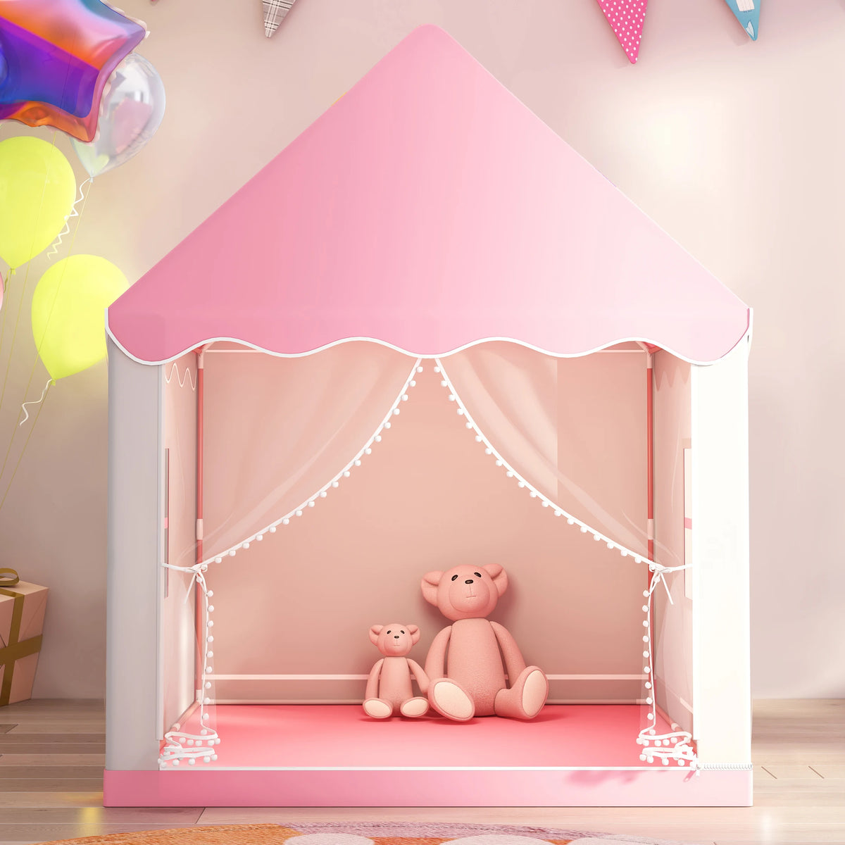 A pink play tent shaped like a castle with a draped interior and two small stuffed animals inside.