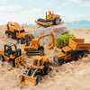 A set of diecast alloy construction vehicles including a yellow truck, excavator, and tractor toy on sand.