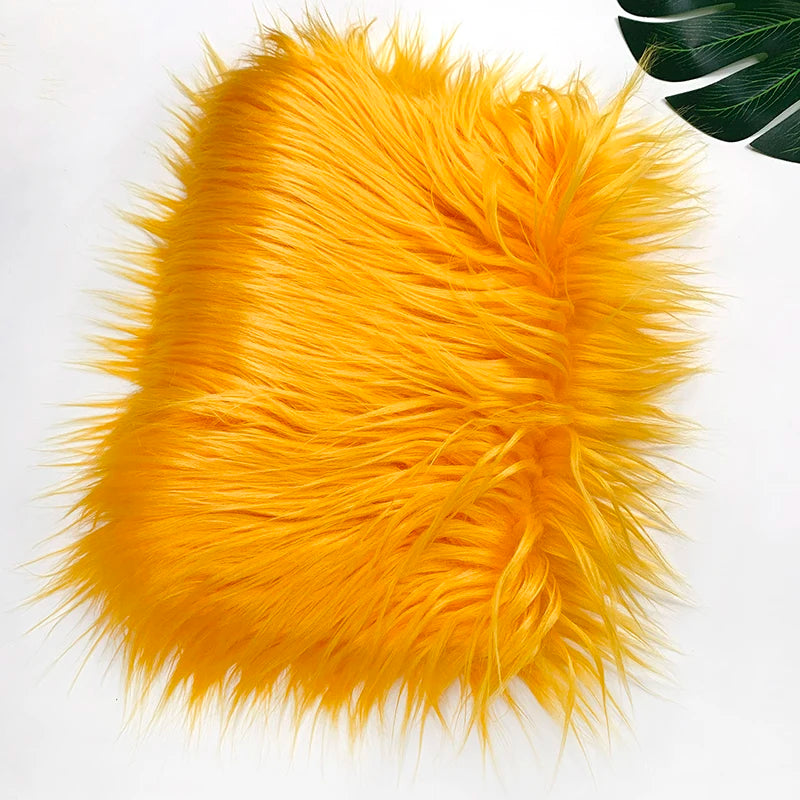 Bright orange fluffy faux fur fabric for DIY sewing, doll hair, and cosplay