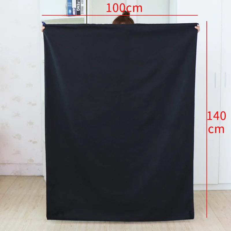 A black heavy-duty canvas laundry bag with a drawstring closure, shown against a white background.
