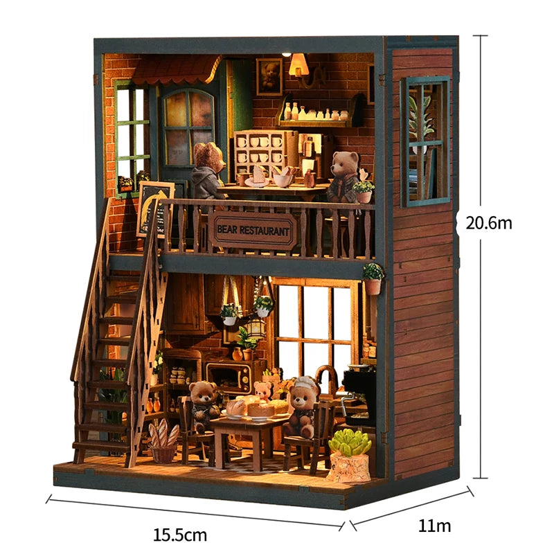 A wooden dollhouse miniature assembly kit featuring a detailed interior with stairs and furniture.