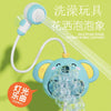 A blue elephant shower bubble elephant toy with a flexible nozzle spraying water and bubbles.