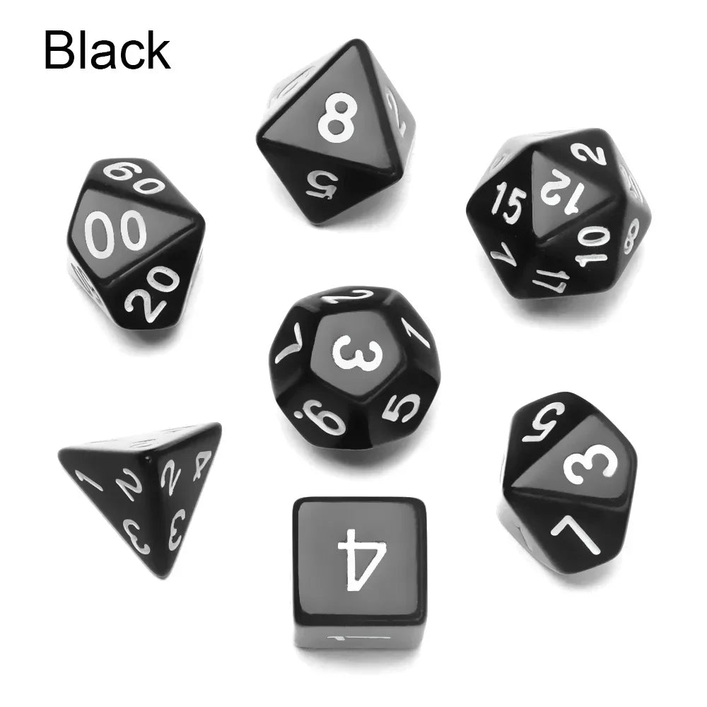 A set of matte black polyhedral dice including an eight-sided die, twenty-sided die, and three-sided die.