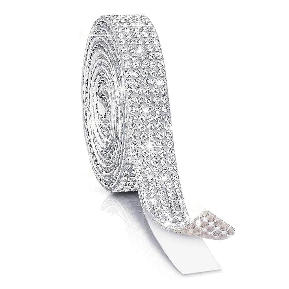A roll of clear rhinestone ribbon used for DIY crafts, showing the sparkling texture and adhesive backing.