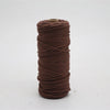 A spool of dark brown macrame cord, 3mm/4mm thickness, used for crafting.