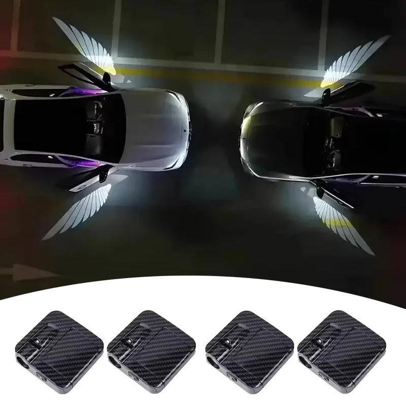 A set of black car door logo projectors with illuminated wings shown from above.