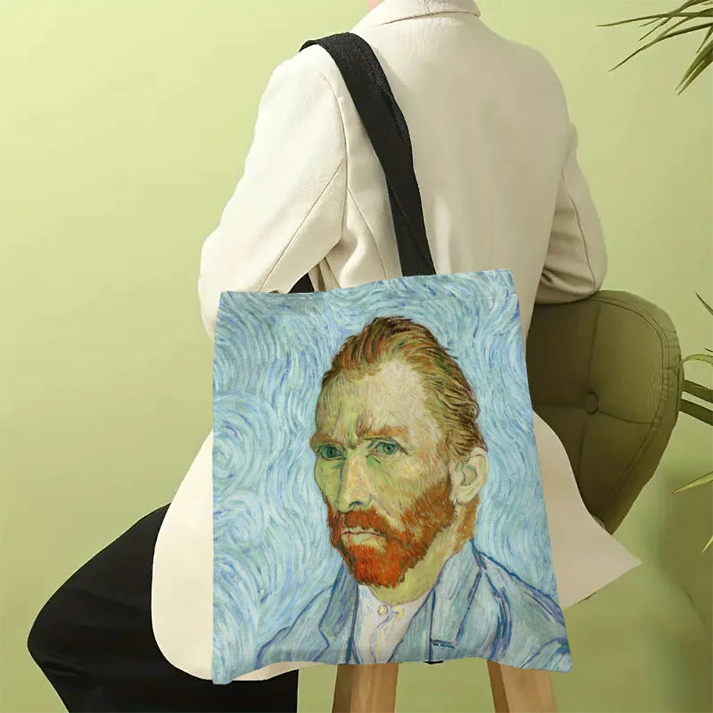 A canvas tote bag featuring a painting of Vincent van Gogh's portrait in blue and yellow tones.