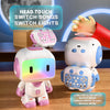 A white robot toy is shown with a pink hand, demonstrating its functions for switching songs and lights.