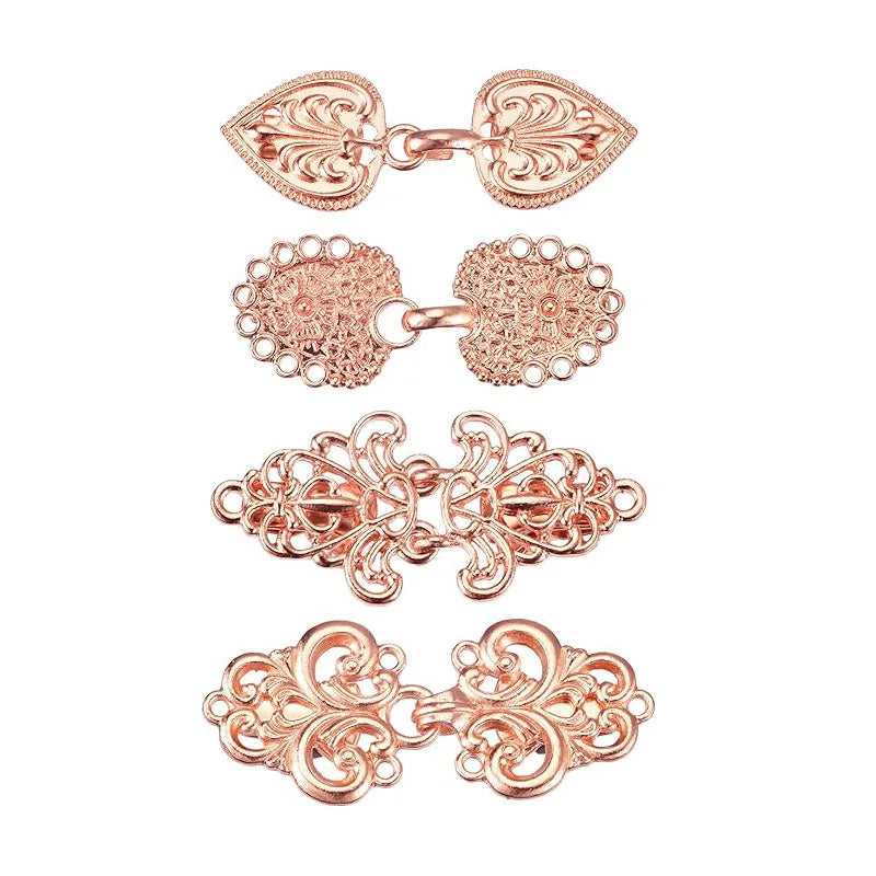 Gold-toned vintage rotating sweater clips for cardigans and shawls